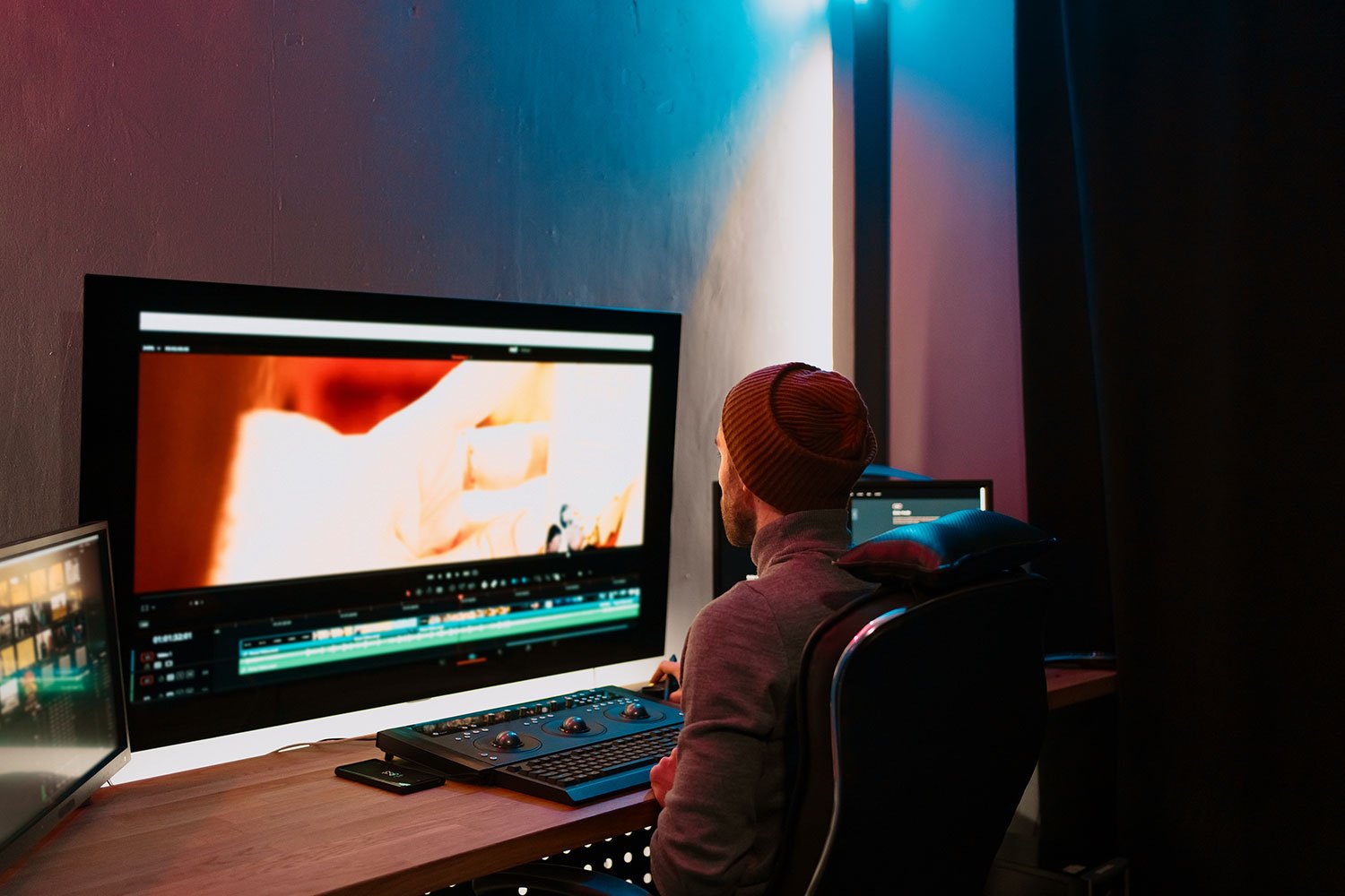 Editor working on a digital video commercial at AdEtc Studios